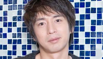 德井义实