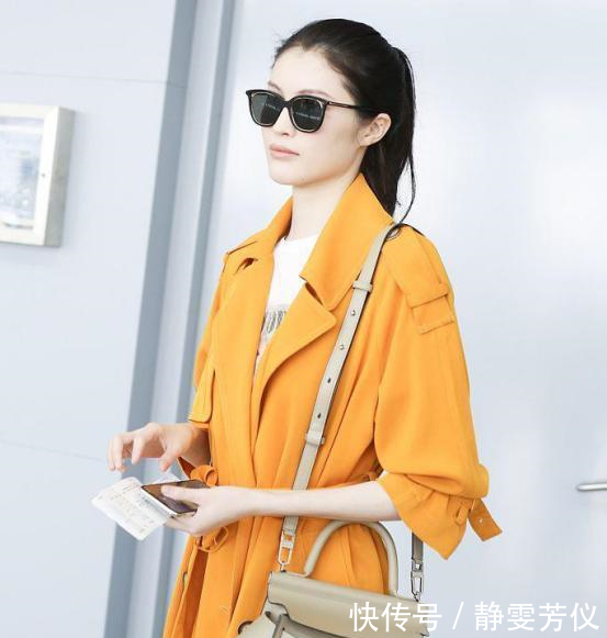 165孙俪和178何穗撞上黄色风衣,身高差了13c