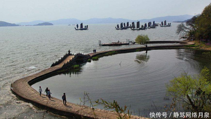 大连GDP为什么上不了万亿_抓拍大连沙滩上妇女(2)